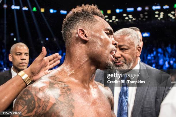 Jermell Charlo defeats Charles Hatley by TKO in the 6th in their WBC Junior Middleweight fight. Charlo is shown here at the end of the fight in...