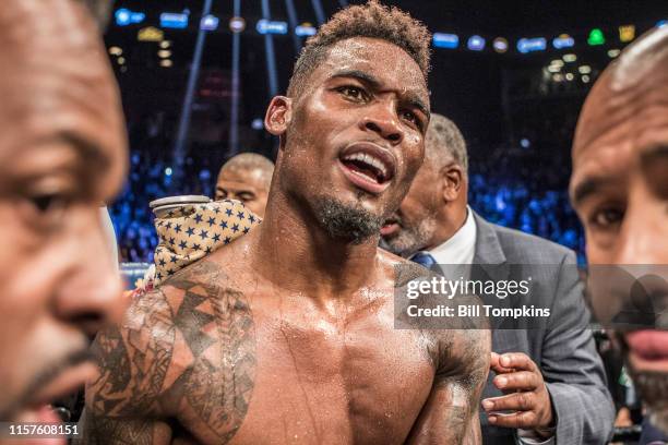 Jermell Charlo defeats Charles Hatley by TKO in the 6th in their WBC Junior Middleweight fight. Charlo is shown here at the end of the fight in...