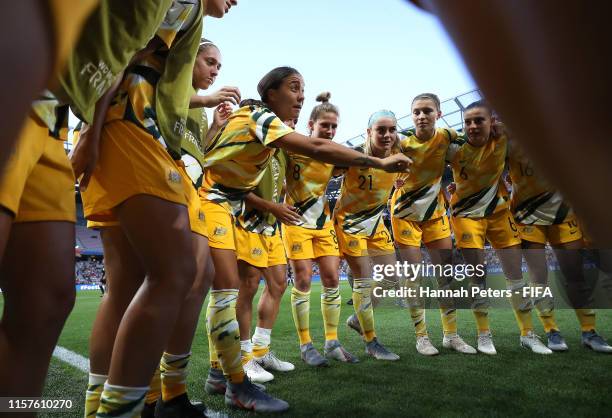 Sam Kerr of Australia speaks to her team during a team huddle prior to the 2019 FIFA Women's World Cup France Round Of 16 match between Norway and...