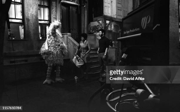 Puppeteer Caroll Spinney in his 'Big Bird' costume with actress Loretta Long and actor Matt Robinson during the taping of an episode of Sesame Street...