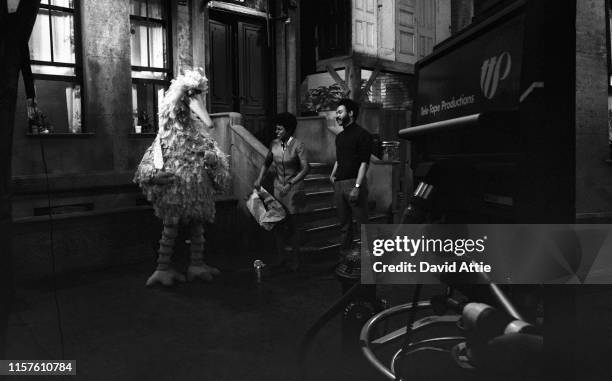 Puppeteer Caroll Spinney in his 'Big Bird' costume with actress Loretta Long and actor Matt Robinson during the taping of an episode of Sesame Street...