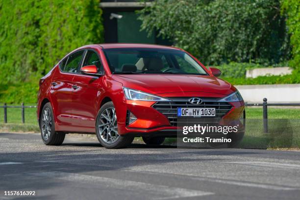 hyundai elantra on the street - hyundai elantra stock pictures, royalty-free photos & images