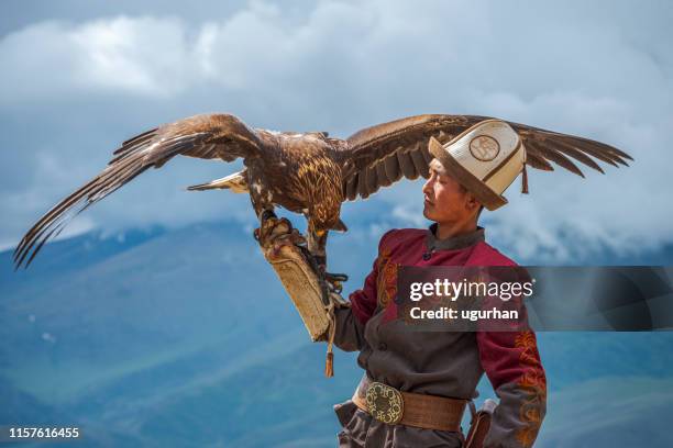 kyrgyz hunter  eagle - kyrgyzstan people stock pictures, royalty-free photos & images