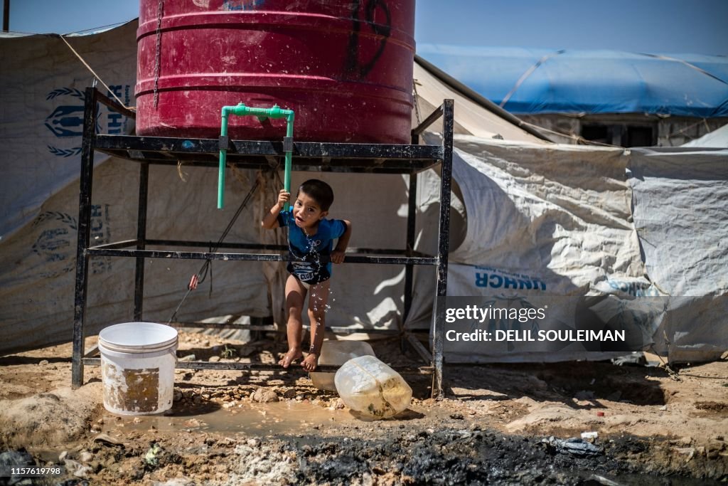 TOPSHOT-SYRIA-CONFLICT-DISPLACED