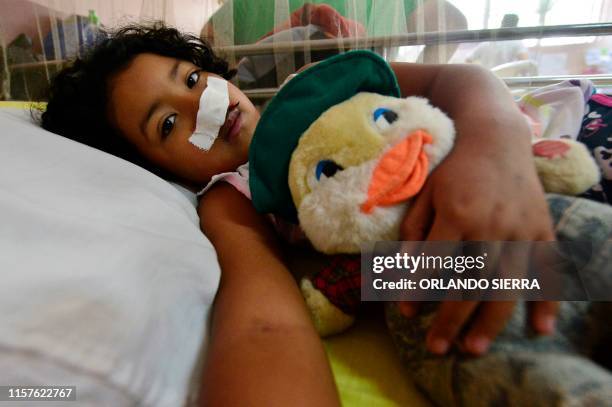 Girl infected with dengue, which vector is the Aedes aegypti, is assisted in the Roberto Suazo Cordova Hospital, in La Paz municipality, La Paz...