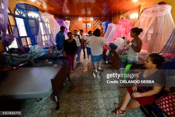 Patients infected with dengue, which vector is the Aedes aegypti, are assisted in the chapel of the Roberto Suazo Cordova Hospital, in La Paz...