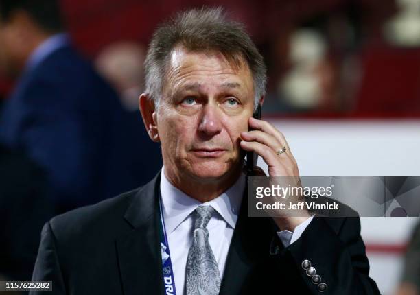 General manager Ken Holland of the Edmonton Oilers is seen talking of the phone during Rounds 2-7 of the 2019 NHL Draft at Rogers Arena on June 22,...