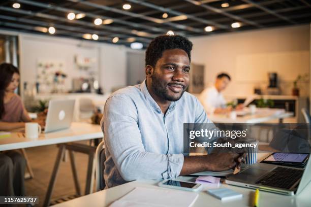 young men in modern office - taipei business stock pictures, royalty-free photos & images