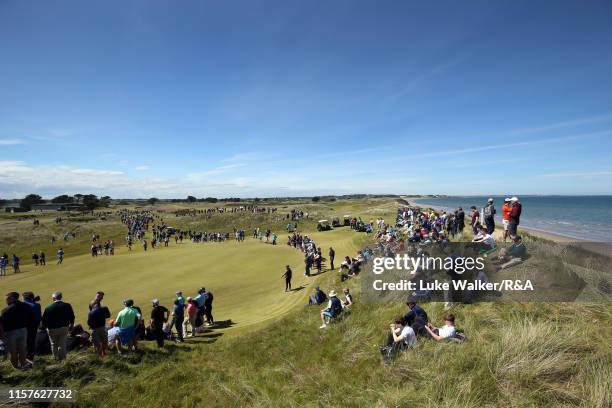 Crowds walk on the golf course during the finals during day six of the R&A Amateur Championship at Portmarnock Golf Club on June 22, 2019 in...