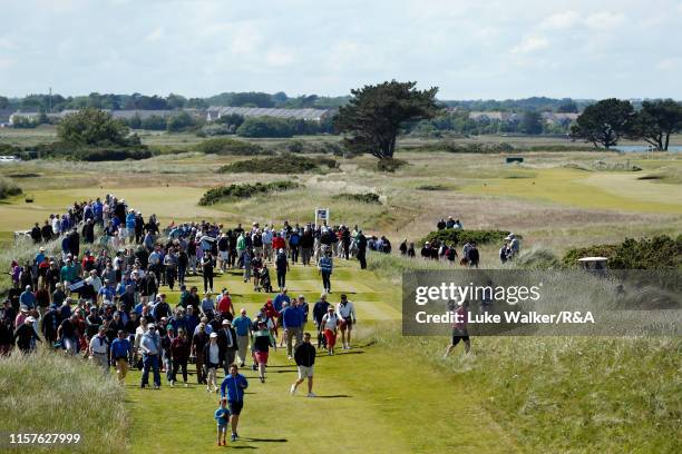 Crowds walk on the golf course during the finals during day six of the R&A Amateur Championship at Portmarnock Golf Club on June 22, 2019 in...