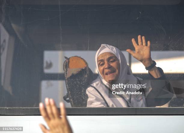 Prospective hajj pilgrims bid their relatives farewell before departure to Saudi Arabia to perform Hajj pilgrimage in Gaza City, Gaza on July 25,...
