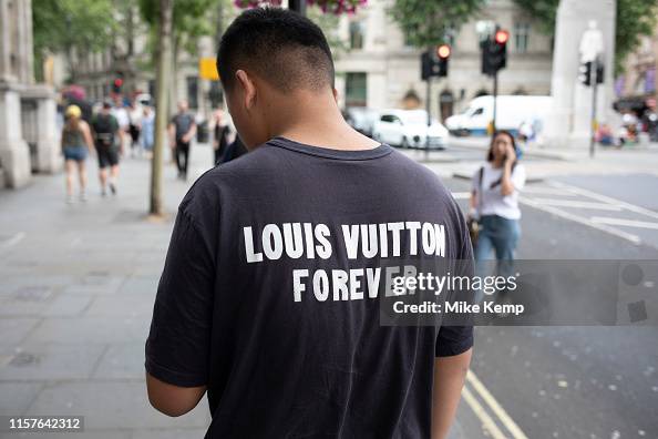 Man wearing a Louis Vuitton forever slogan t-shirt in London, United  News Photo - Getty Images