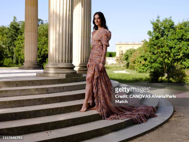 Fashion designer Ariana Rockefeller wearing a dress by Dior is photographed for Paris Match on June 29, 2019 at the Chateau de Versailles, France.