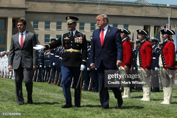 President Donald Trump and Secretary of Defense Dr. Mark Esper inspect the troops during a full honors welcome ceremony on the parade grounds at the...