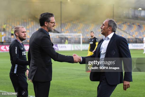 Rikard Norling, head coach of AIK and Darko Milanic head coach of Maribor shake hands during the Second qualifying round of the UEFA Champions League...