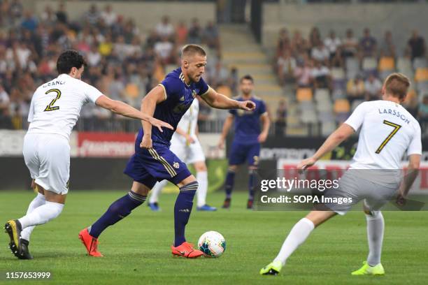 Daniel Granli, Sebastian Larsson of AIK and Andrej Kotnik of Maribor in action during the Second qualifying round of the UEFA Champions League...