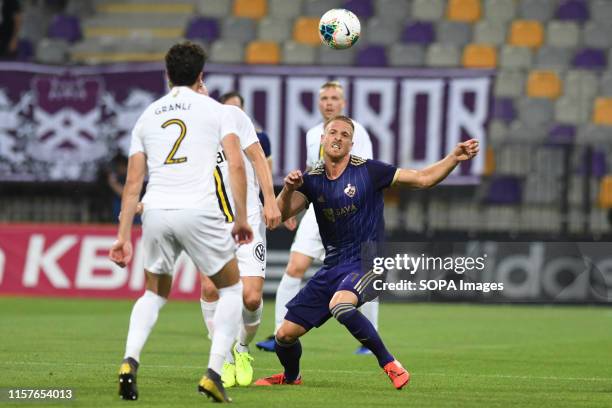 Daniel Granli of AIK and Andrej Kotnik on Maribor in action during the Second qualifying round of the UEFA Champions League between NK Maribor and...