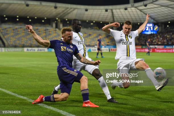 Dino Hotic of Maribor, Enoch Kofi Adu and Karol Mets of AIK in action during the Second qualifying round of the UEFA Champions League between NK...