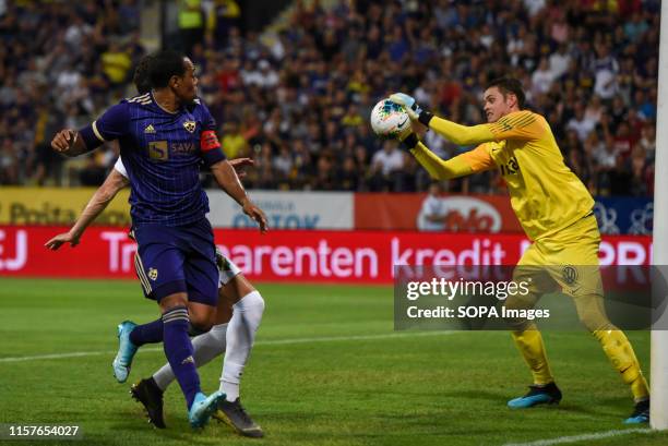 Marcos Tavares of Maribor and Oscar Linnér of AIK in action during the Second qualifying round of the UEFA Champions League between NK Maribor and...