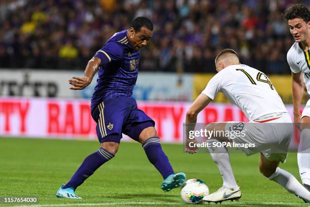 Marcos Tavares of Maribor and Karol Mets of AIK in action during the Second qualifying round of the UEFA Champions League between NK Maribor and AIK...