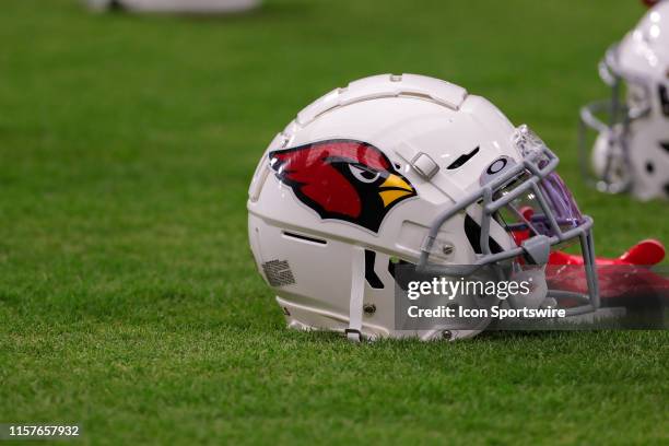 An Arizona Cardinals helmet on the field during the Arizona Cardinals training camp on July 25, 2019 at State Farm Stadium in Glendale, Arizona.