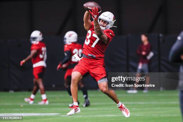 Arizona Cardinals running back D.J. Foster catches a pass during the Arizona Cardinals training camp on July 25, 2019 at State Farm Stadium in...