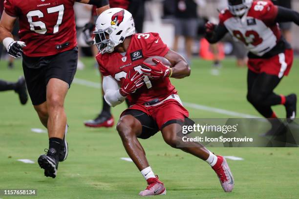 Arizona Cardinals running back David Johnson runs the ball during the Arizona Cardinals training camp on July 25, 2019 at State Farm Stadium in...