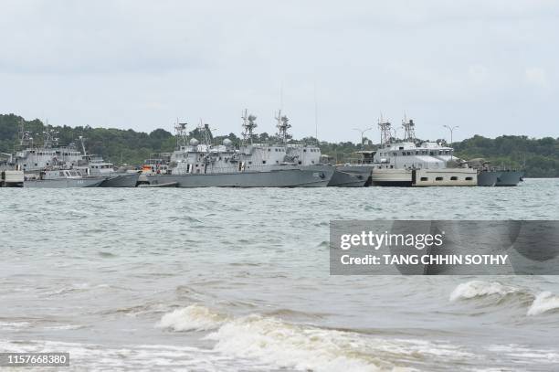 Cambodian navy boats are berthed at a jetty in Ream naval base in Preah Sihanouk province during a government organized media tour on July 26, 2019....