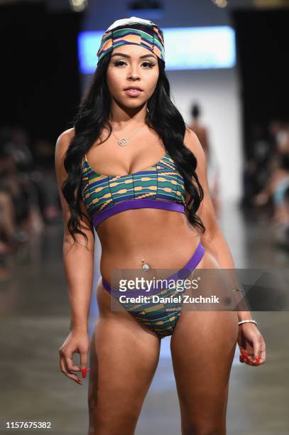 Model walks the runway during the New York Summer Fashion Explosion hosted by Teresa Giudice on June 22, 2019 in New York City.
