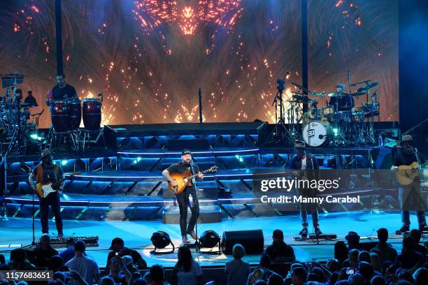 The Zac Brown Band performs on stage at PNC Bank Arts Center on June 22, 2019 in Holmdel, New Jersey.