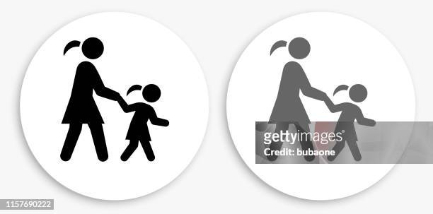 mother & daughter black and white round icon - family walking stock illustrations