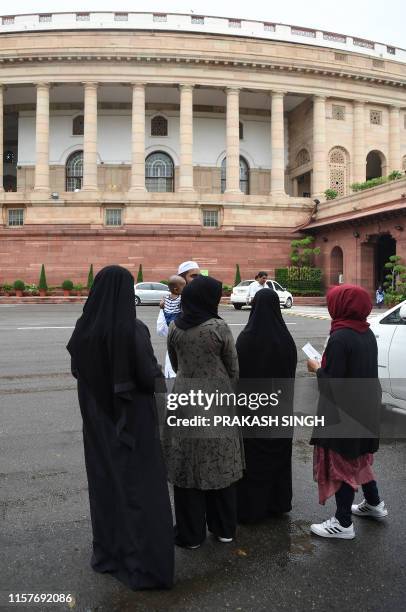 Muslim women visit the Parliament house to watch the current session from viewer's gallery in New Delhi on July 26, 2019. India's Parliament Lok...