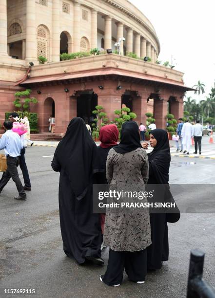 Muslim women visit the Parliament house to watch the current session from viewer's gallery in New Delhi on July 26, 2019. India's Parliament Lok...