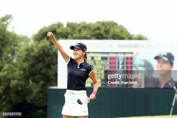 Hikari Fujita of Japan celebrates winning the tournament on the 18th green during the final round of the Yupiteru Shizuoka Shimbun SBS Ladies at...