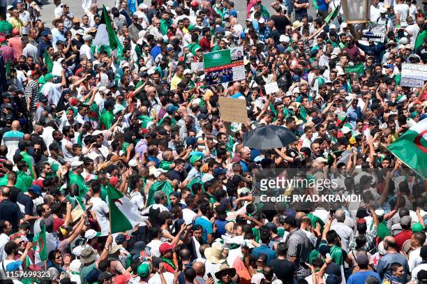 Algerian protesters demonstrate in Algiers on July 26 in the latest in weeks of rallies against the ruling class amid an ongoing political crisis in...