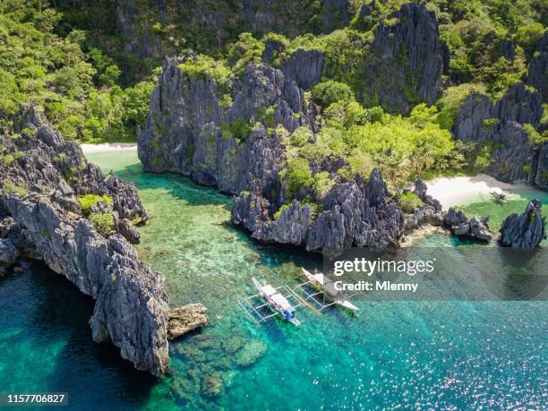 palawan matinloc island hidden beach philippines - el nido stock pictures, royalty-free photos & images