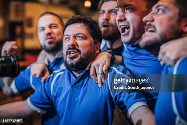 group of men in pub - pub mates stock pictures, royalty-free photos & images