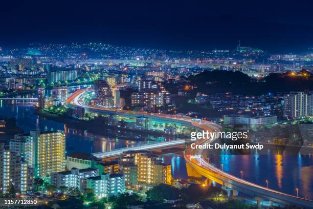 the cityscape of fukuoka during the night - fukuoka prefecture ストックフォトと画像