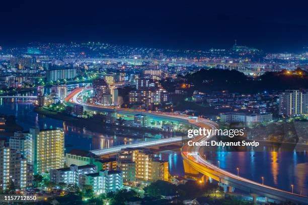 the cityscape of fukuoka during the night - prefeitura de fukuoka - fotografias e filmes do acervo