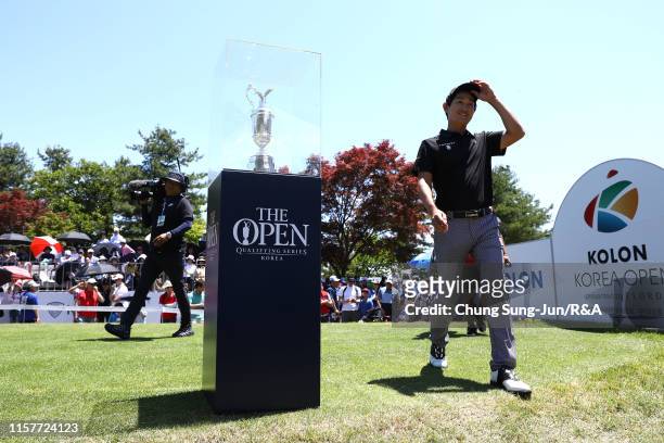 Dongkyu Jang of South Korea prepares for tee shot on the 1st hole during The Open Qualifying Series, part of the Kolon Korea Open at Woo Jeong Hills...