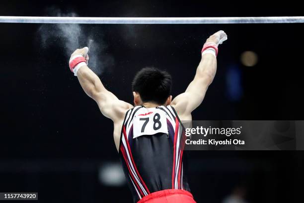 Kenzo Shirai fails to catch a bar while competing in the Men's Horizontal Bar final on day two of the 73rd All Japan Artistic Gymnastics Apparatus...