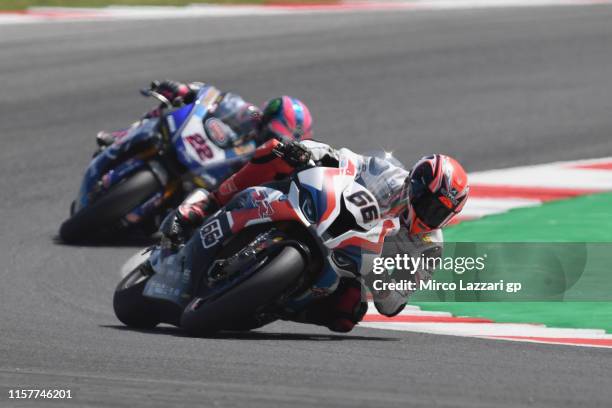 Tom Sykes of Great Britain and BMW Motorrad WorldSBK Team leads the field during the Tissot Superpole race during the FIM Superbike World...