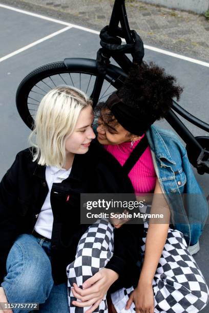LGBT couple leaning in close
