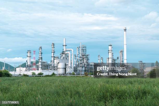 oil refinery and petrochemical plant view in blue sky, oil and gas industry - 採掘 ストックフォトと画像