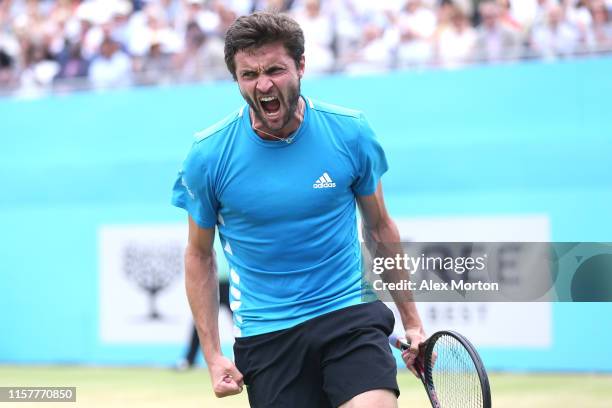 Gilles Simon of France celebrates winning the second set during the mens singles final against Feliciano Lopez of Spain during day seven of the...