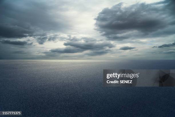 empty parking lot - dramatic sky road stock pictures, royalty-free photos & images