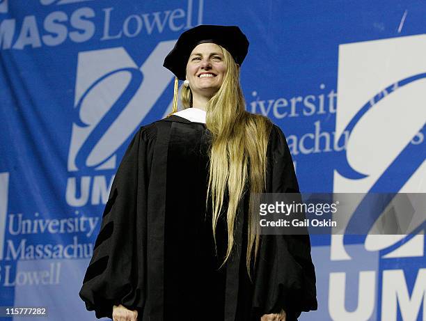 Bonnie Comley receives a distinguished alumni award from the University of Massachusetts Lowell during commencement ceremonies at the University of...