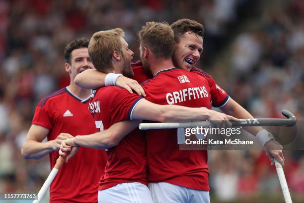 Alan Forsyth of Great Britain celebrates scoring his side's second goal with team mates during the Men's FIH Field Hockey Pro League match between...