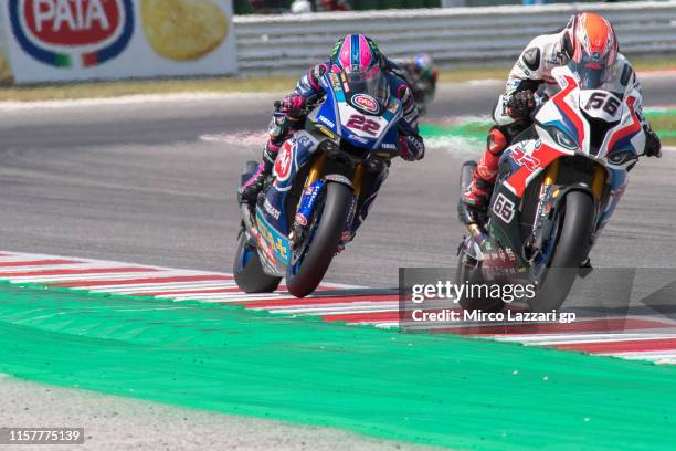 Tom Sykes of Great Britain and BMW Motorrad WorldSBK Team leads the field during the Tissot Superpole race during the FIM Superbike World...