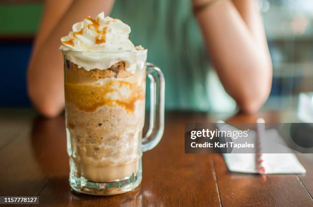 cold coffee espresso caramel and whipped cream - blended coffee drink stock pictures, royalty-free photos & images